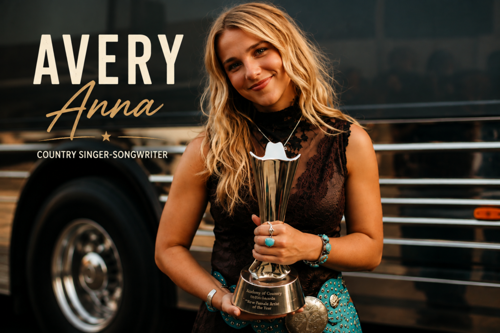 Avery Anna holding a country music award trophy in front of a tour bus